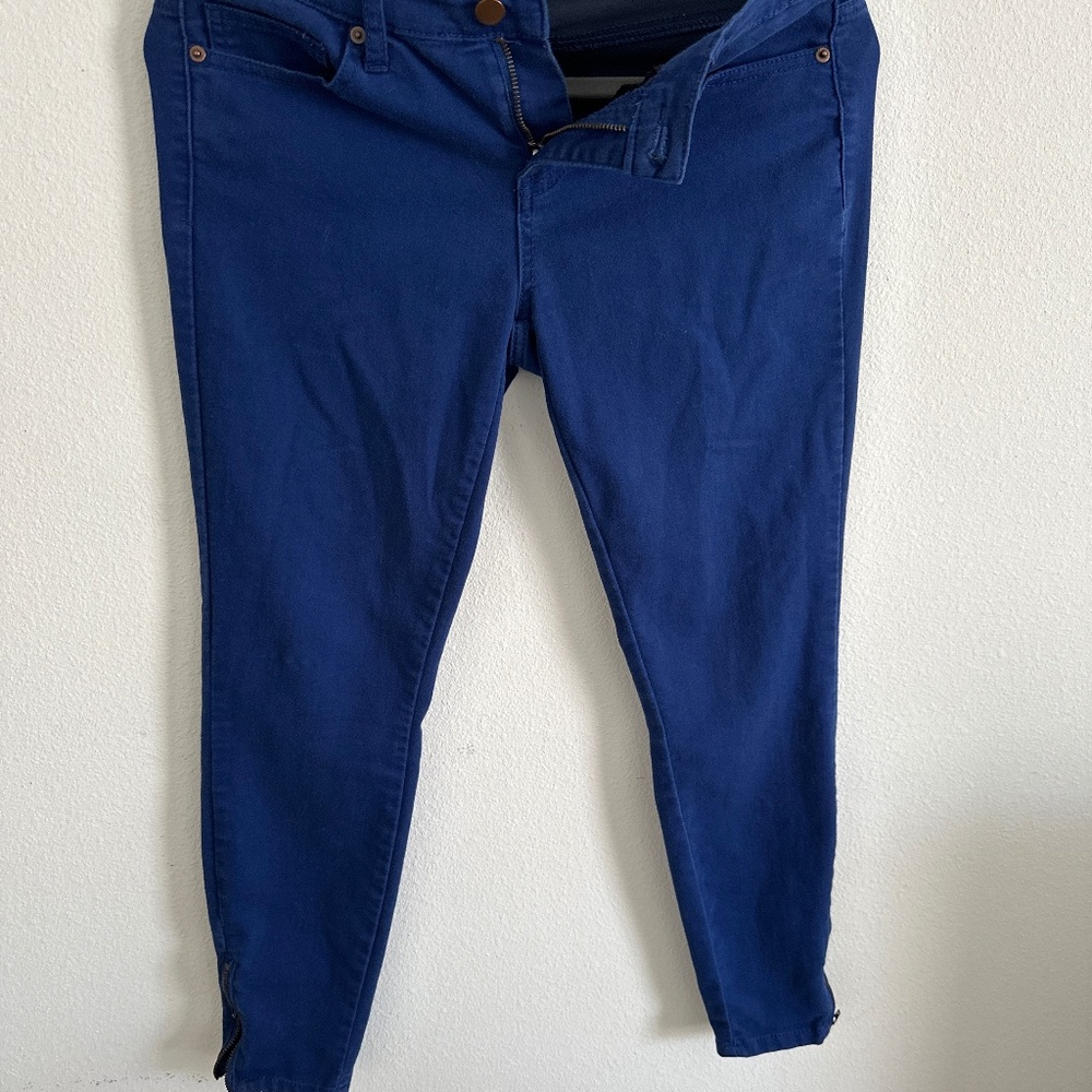 Dark blue, black, and light wash jeans